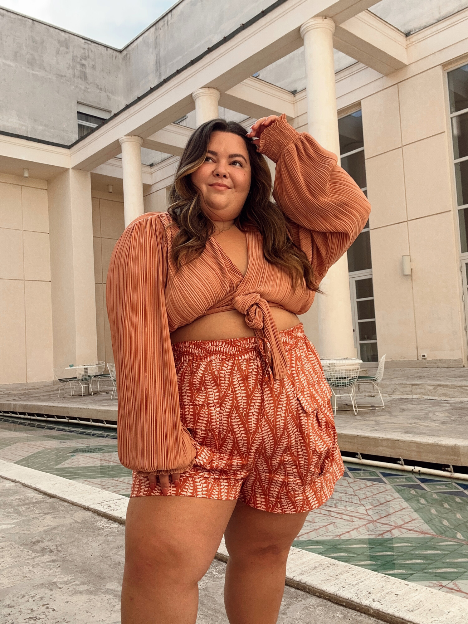 plus size fashion blogger Natalie in the City wears a plus size outfit from nuuly while on vacation in Italy.